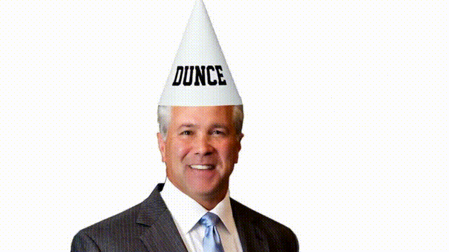 Fairhope Council President Burrell depicted wearing a dunce cap, referencing criticism over K-1 Center deal decisions - Animated